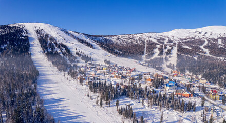 Sheregesh ski lift resort winter, landscape mountain and hotels, aerial top view Russia Kemerovo...