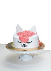 Beautiful cake in the shape of a cat on white background