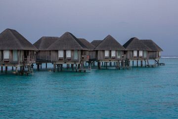 Water Bungalows in Turquoise Sea at Maldives