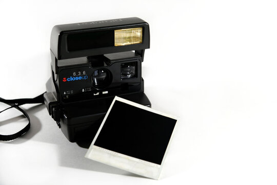 Polaroid Camera On A White Background