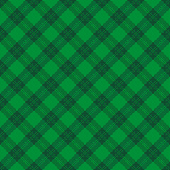 St. Patricks day dioganal tartan plaid. Scottish pattern in green and dark green cage. Scottish cage. Traditional Scottish checkered background. Seamless fabric texture. Vector illustration