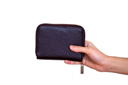 Hand Holding Brown Wallet Isolated On White Background.