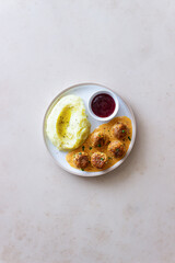 Swedish meatballs in cream sauce, potatoes and lingonberry sauce. Swedish cuisine. Recipe.