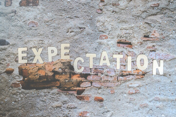 The expectations word on the wall. Business Concept image.