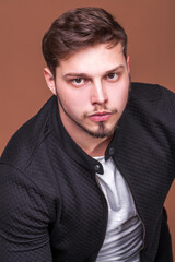 Portrait of a young guy with a beard