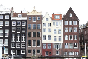 Fototapeta na wymiar Amsterdam Damrak Canal House Facades, Netherlands