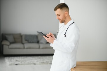 handsome male doctor portrait in office