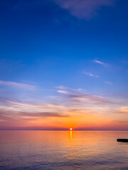 Obraz na płótnie Canvas Summer sea design template. Beautiful sunset on tropical beach and sunlight on horizon