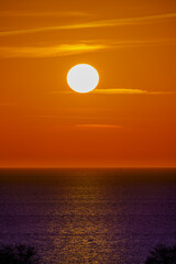 Fototapeta premium Sunset over water. Sunrise over sea