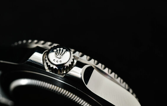 Bangkok Thailand- Feb 20,2022 : Close-up view of the side of a Rolex watch GMT-Master II "Batman"40mm Steel Ceramic Men's Wrist watch on black background