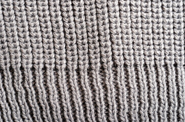 Knitted fabric. Texture close-up. Designer concept