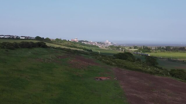Slow panned 180 degree panorama showing Thames estuary from distant Southend, Canvey Island, Benfleet and Thames Haven gateway port