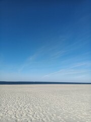 horizon on the beach under blue sky