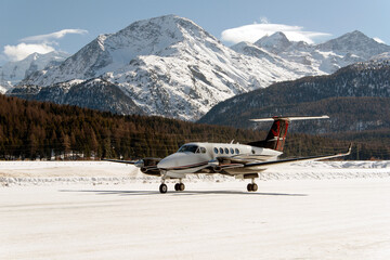 A private jet ready to take off in Engadine St Moritz airport