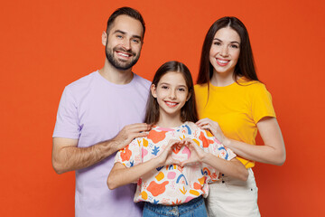 Young smiling parents mom dad with child kid daughter teen girl in basic t-shirts showing shape...