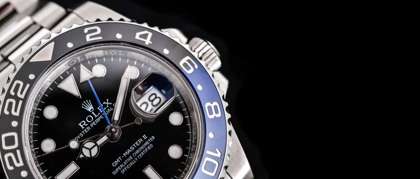 Bangkok Thailand- Feb 20,2022 :Close up Rolex GMT-Master II "Batman"40mm with blue-black bezel Steel Ceramic Men's Wrist watch on black background