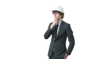 Caucasian business engineer touching his chin looking at copy space with thinking expression. Portrait of construction foreman wearing suit and hard hat over isolated white background.