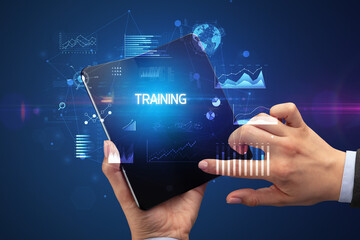 Businessman holding a foldable smartphone, business concept