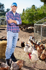 male farmer on chicken farm