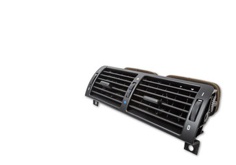 A close-up view of a part of the interior of a modern car with a view of the ventilation deflector of the heater for heating and cooling the passenger compartment. Used auto part catalog from junkyard