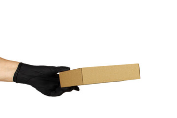 Hand in a black glove holds a box, isolated on a white background.