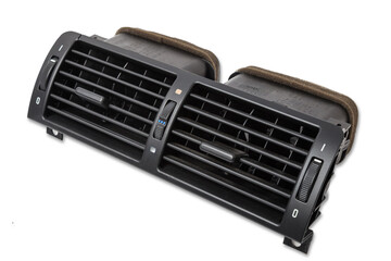 A close-up view of a part of the interior of a modern car with a view of the ventilation deflector of the heater for heating and cooling the passenger compartment. Used auto part catalog from junkyard