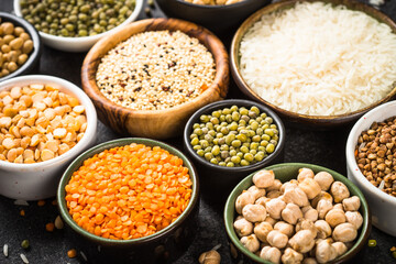Gluten free food, cereals. Rice, buckwheat, corn, lentils, soy beans and quinoa at black. Allergen free food.
