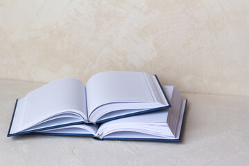 open notebooks, books on a bright table. Education. Business concept