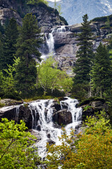 Fototapeta na wymiar Mountain waterfall in the Tatra Mountains