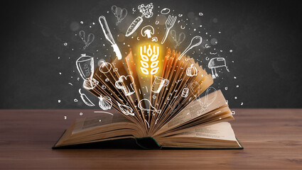 Open recipe book with food related icons above