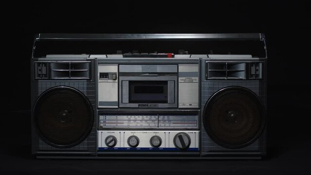 Old vintage cassette microphone on a black background. Retro and vintage concept