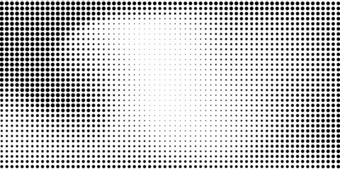 Halftone dotted background. Black dots in modern style on a white background.