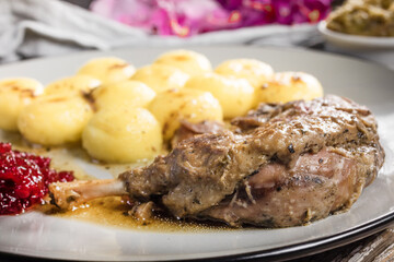Roasted duck leg.