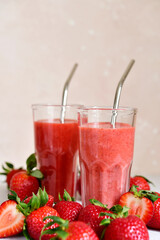 Fresh strawberry smoothie in a glass.