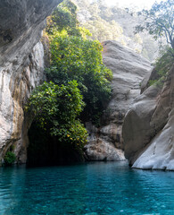 Fototapeta na wymiar natural rocky canyon with blue water in Göynük, Turkey