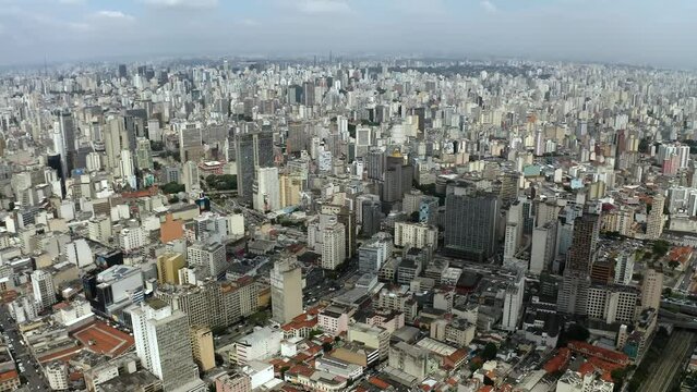 Overpopulation of the metropolis. Aerial of a dense residential area with many houses and buildings. Sao Paulo, Brazil.