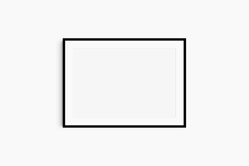 Horizontal frame mockup 7:5, 70x50, A4, A3, A2, A1 landscape. Single black frame mockup. Clean, modern, minimalist, bright. Passepartout/mat opening in 3:2 aspect ratio. - obrazy, fototapety, plakaty