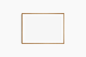Horizontal frame mockup 7:5, 70x50, A4, A3, A2, A1 landscape. Single cherry wood frame mockup. Clean, modern, minimalist, bright. Passepartout/mat opening in 3:2 aspect ratio.