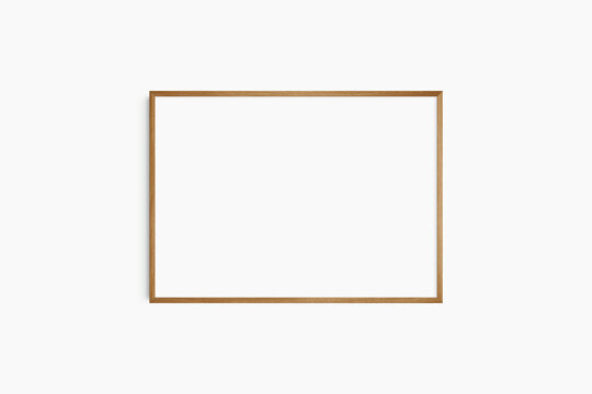 Horizontal frame mockup 7:5, 70x50, A4, A3, A2, A1 landscape. Single cherry wood frame mockup. Clean, modern, minimalist, bright.