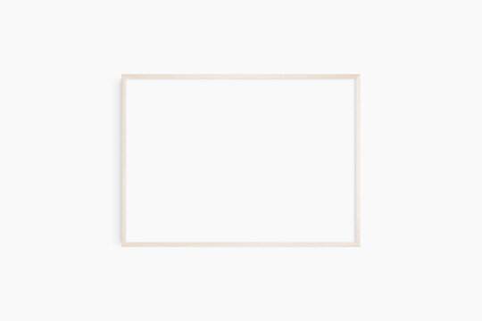Horizontal frame mockup 7:5, 70x50, A4, A3, A2, A1 landscape. Single light wood frame mockup. Clean, modern, minimalist, bright.