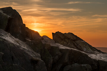 Rock formation at the summit of the Wolfwarte in the Harz Mountains at sunset