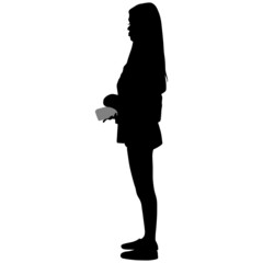 Black silhouette of slender woman in trousers with long hair with phone in her hand