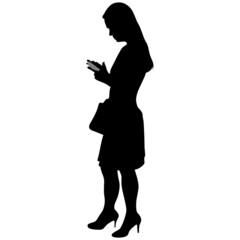 Black silhouette of slender woman with bag, in skirt, in high-heeled shoes with phone in her hands
