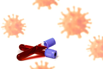 Against the background of flying coronavirus cells, two test tubes with a blood test.