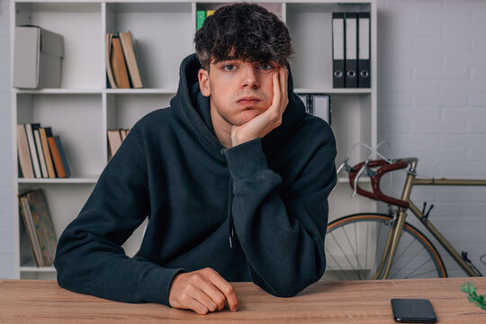 Teenager Or Student At Home With Bored Or Tired Expression