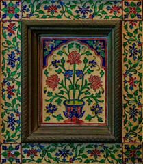 Close up of an ornate wooden door with floral design in Singapore Chinatown