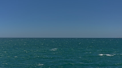 Obraz premium Calm blue sea and sky