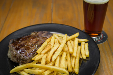 Delicious grilled entrecote dish with french fries