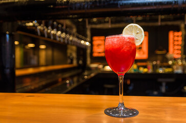 Close-up of delicious drink in glass of red berries.