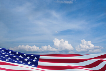 USA flag on a background of blue sky. National holidays concept